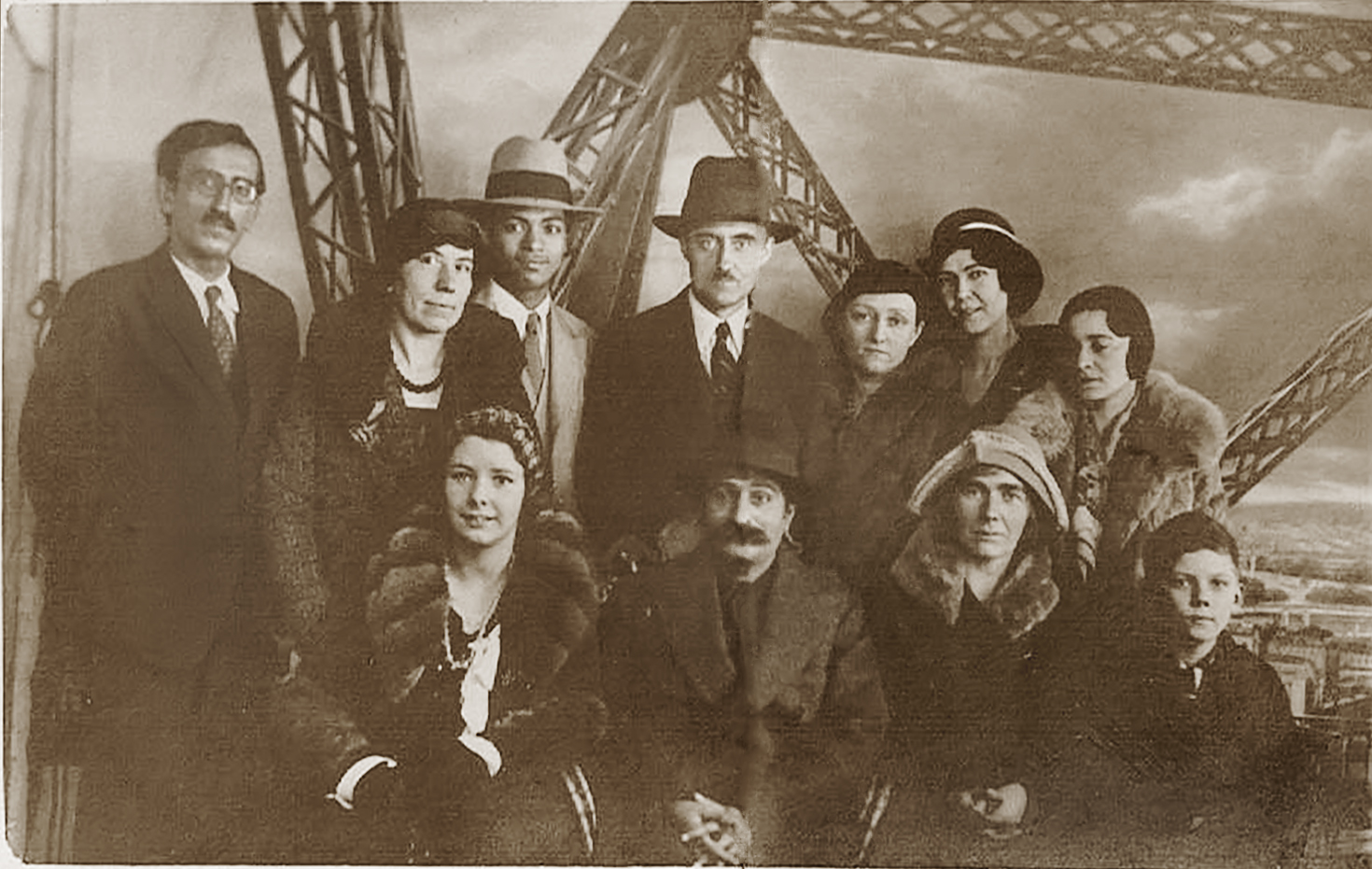 at the Eiffel Tower, 13 December 1931 seated: Zilla Cluse, Baba, Margaret Starr, John Cousins standing: Chanji, Kitty Davy, Agha Ali, Meredith Starr, Margaret Craske, Kim Tolhurst and Delia DeLeon
