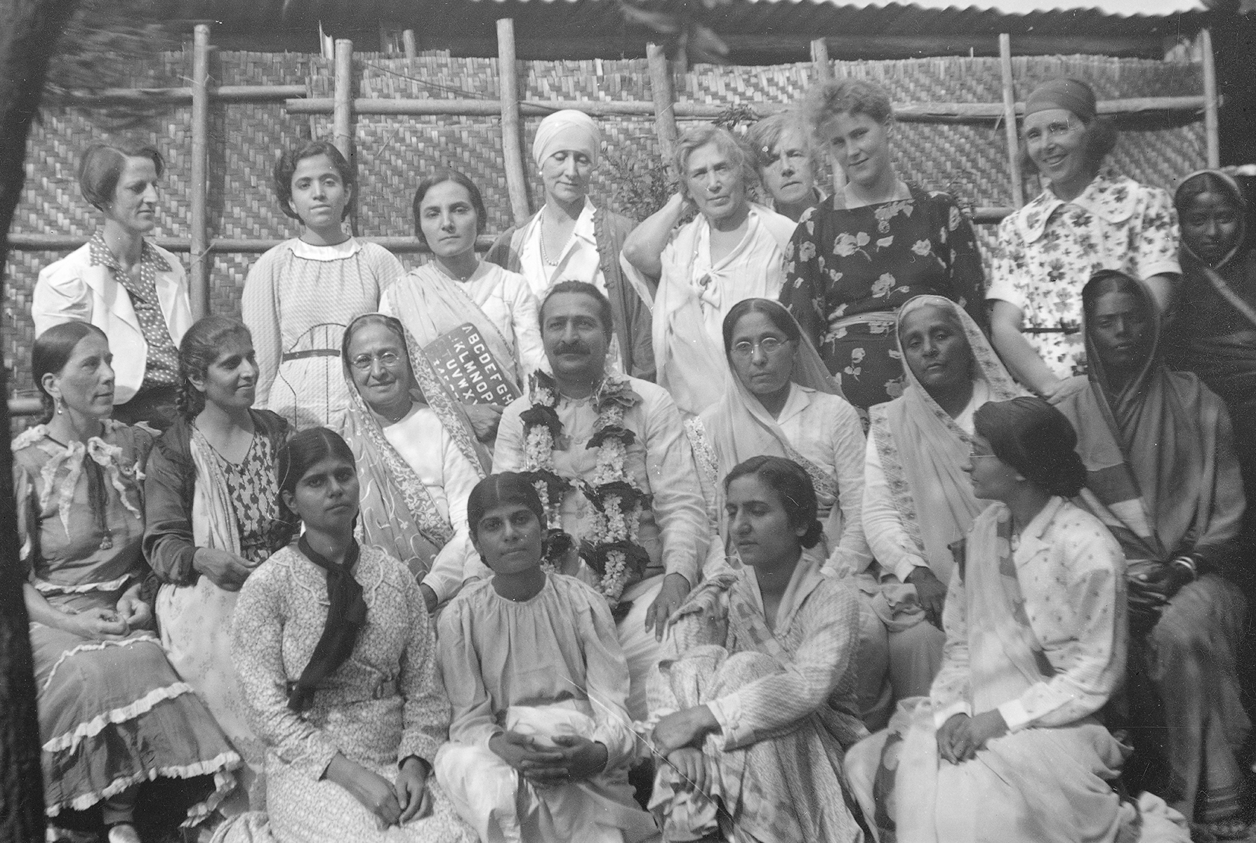 Meherabad, 1938 front: Manu & Meheru Jessawala, Khorshed, Mansari seated: Kitty, Gaimai, Shireenmai, Baba, Gulmai, Soonamasi, Walu standing: Rano, Mani, Mehera, Norina, Nadine, Helen, Irene, Hedi, servant