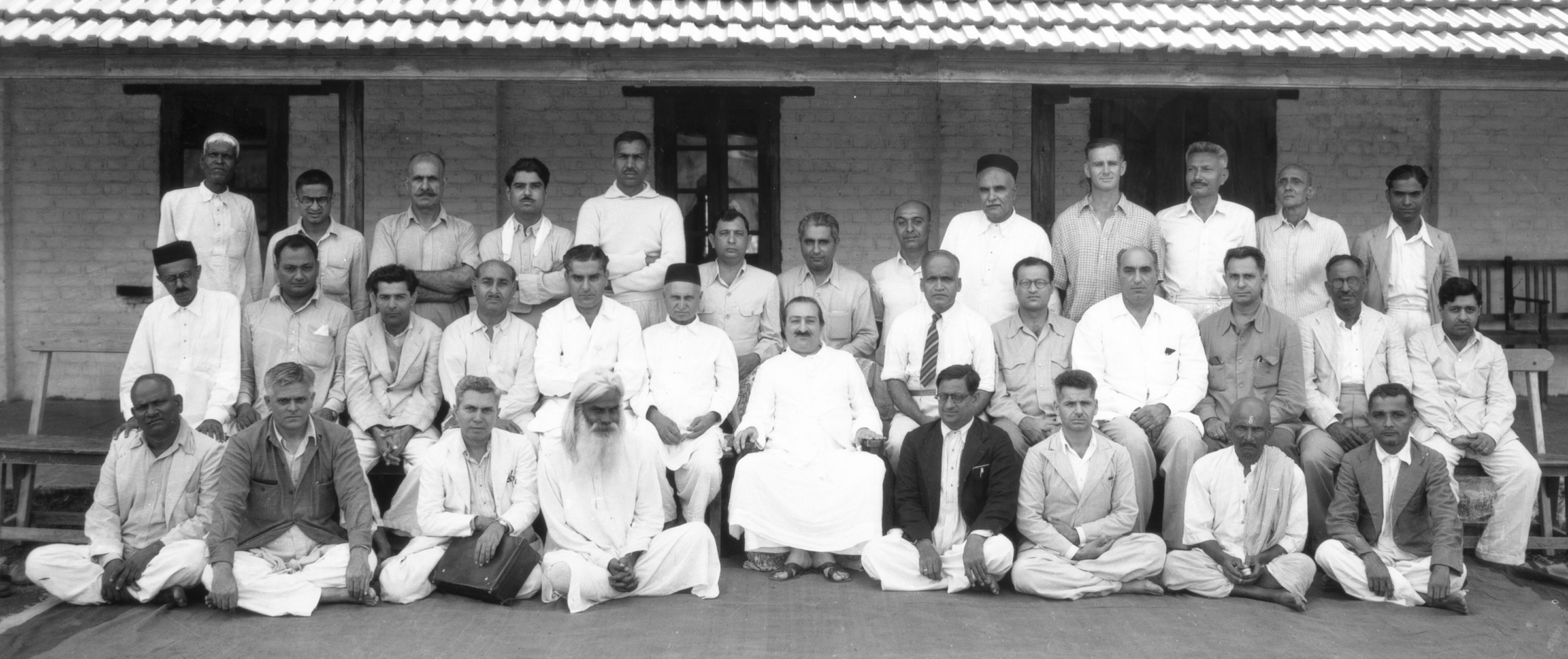 top row: Anna 104, Murli Kale, Baidul, Eruch, Chhagan, Minoo Kharas, Adi Sr., Pendu, Sailor, Donkin, Padri, Kalemama, Dattu Mehendarge center row: Feram, Nilu, Jal, Kaka, Adi Jr., Gustadji, Baba, Ghani, Nariman, Sarosh, Meherjee, Khak Saheb, Savak Damania on the ground: Sidhu , Ramjoo, Savak Kotwal, Babadas, Dhake, Aloba, Bal Tambat, Vishnu
