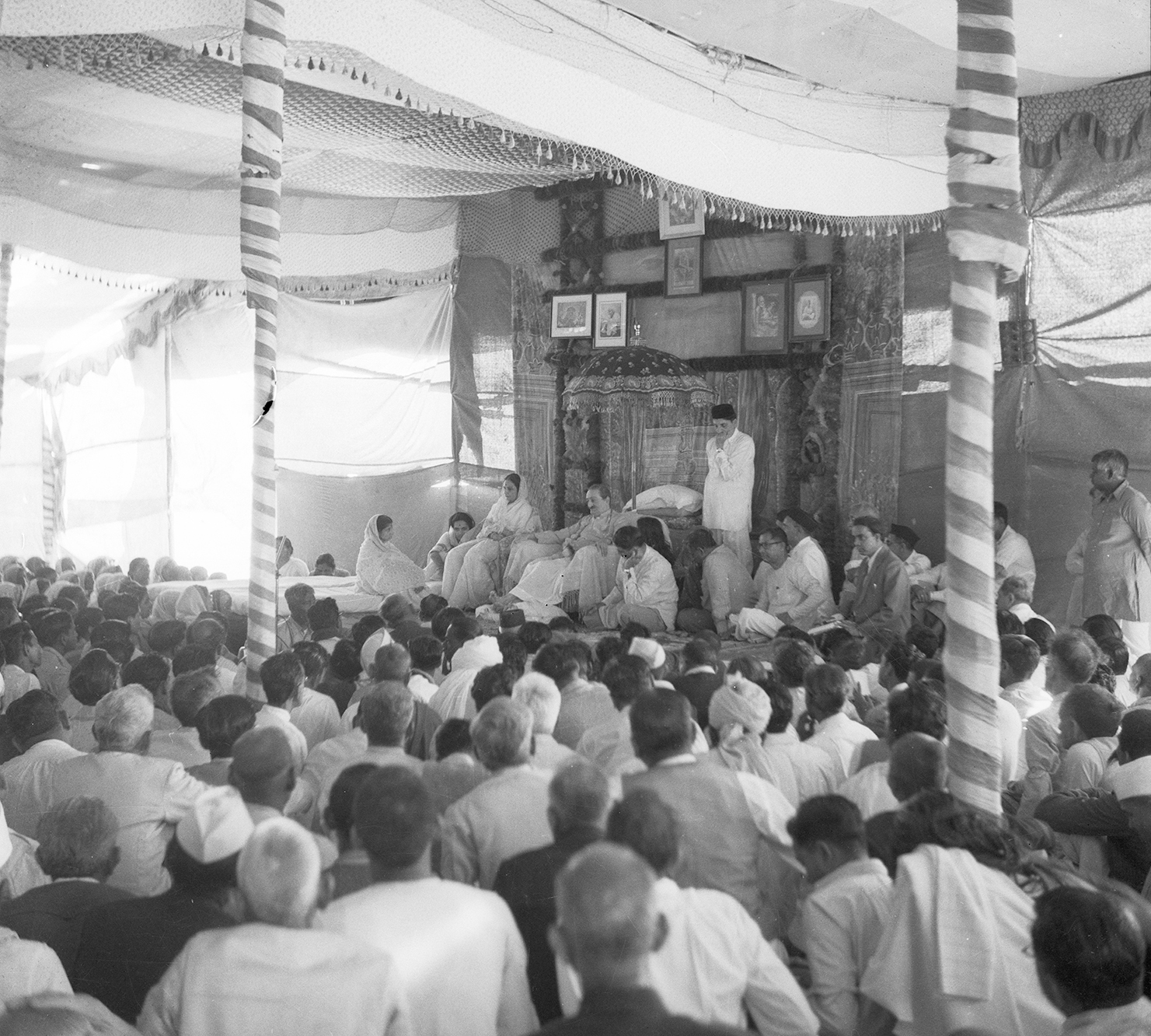 Meherabad, February 1958 Godavri Mai seated next to Baba