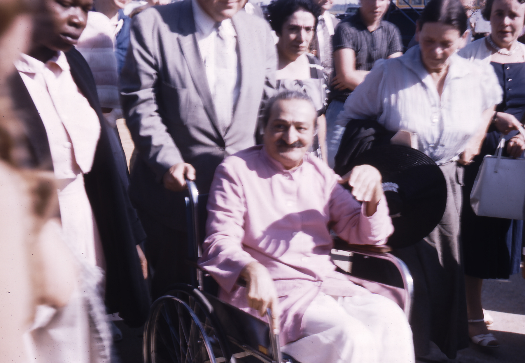 Wilmington airport, 30 May 1958 Beryl Williams, Lud Dimpfl pushing Baba's wheelchair Carrie Ben Shammai (2nd from right)